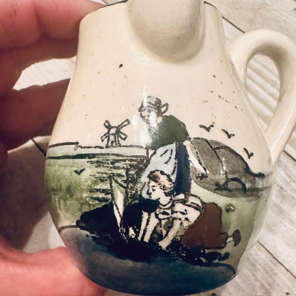 Handcrafted Ceramic Pitcher with Artistic Design - Picture 3 of 7